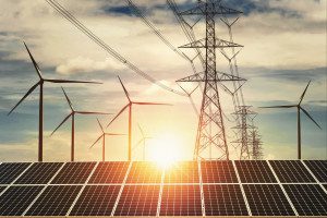 wind and solar pamels and a high-voltage line - an example of distributed generation